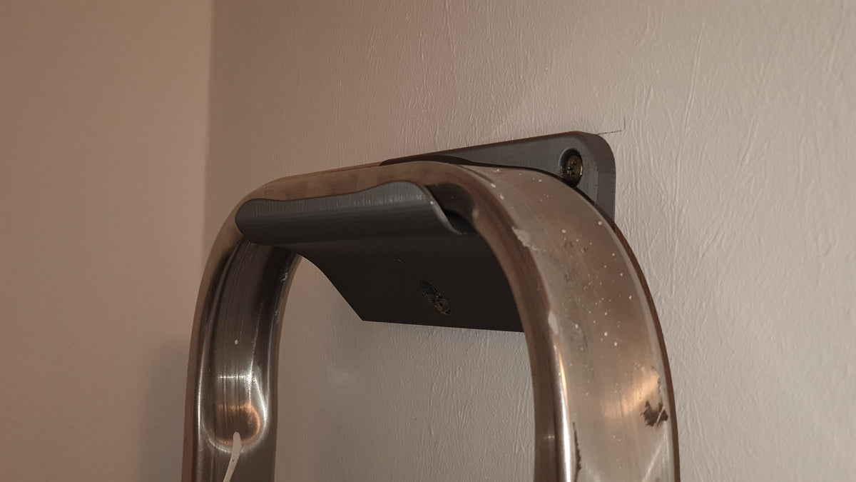 Wandhaak voor een ladder – houd de ladder van de vloer