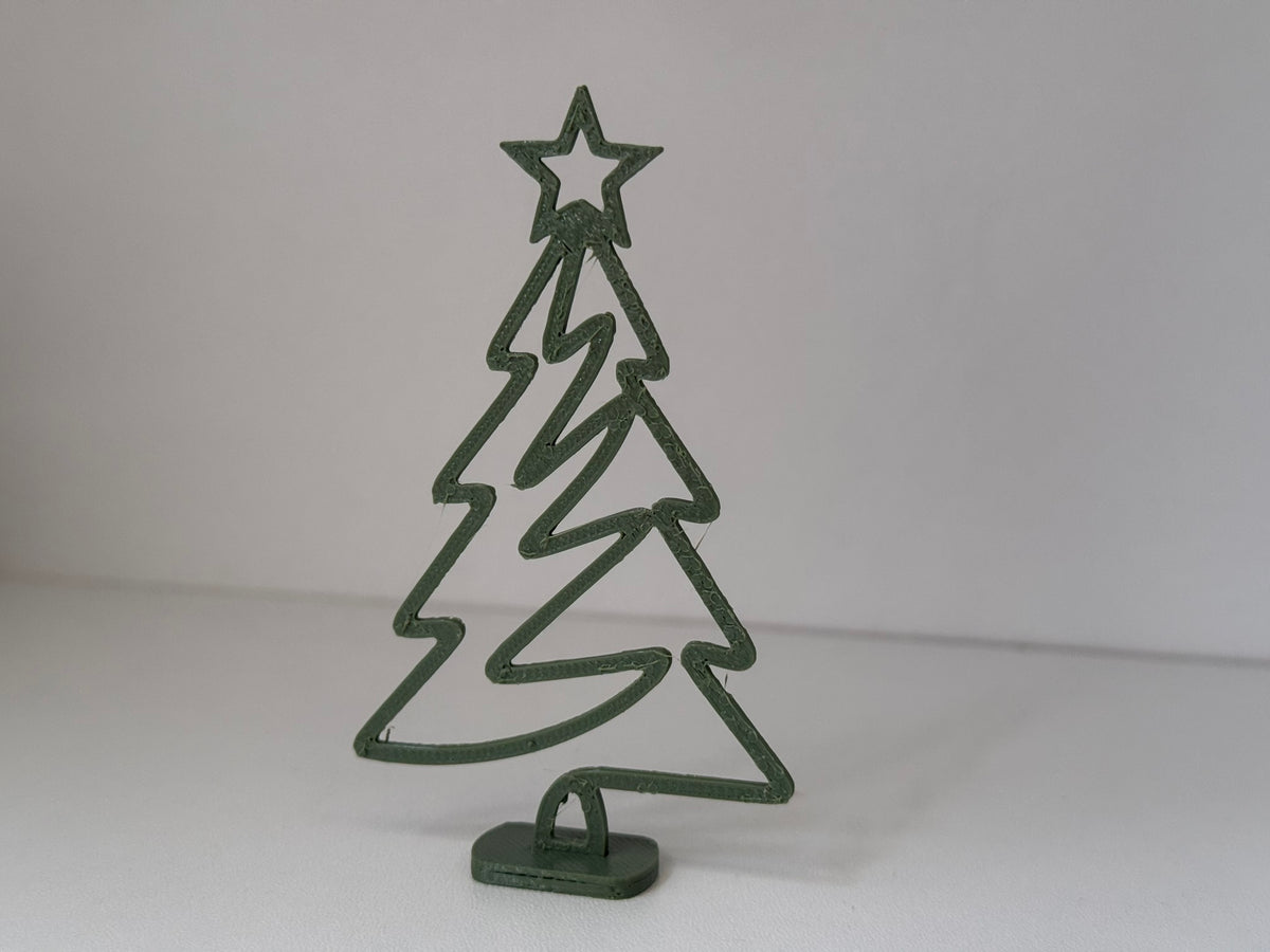 Minimalistisch kerstboomfiguurtje met ster en standaard