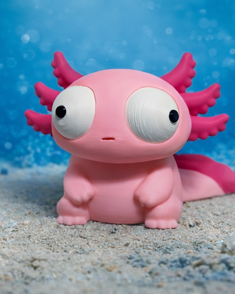 Gek axolotlfiguurtje met grote beweegbare ogen, van voren gezien