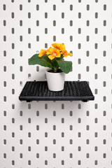 Modulaire witte plank voor het IKEA Skådis-gaatjesbord met planten en decoratie
