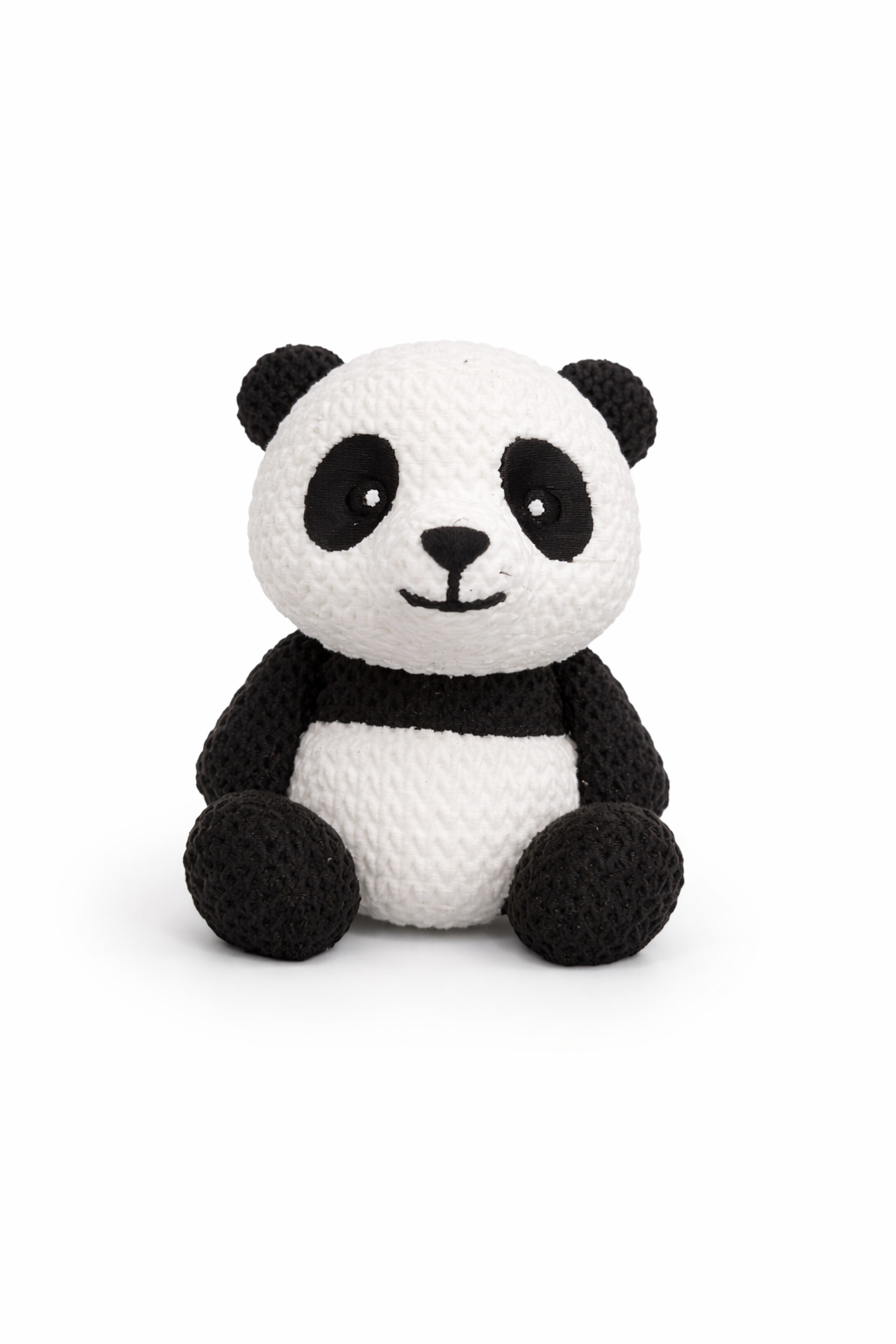 Pandafiguurtje van opzij gezien op een houten plank
