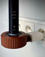 Houder voor de Philips Sonicare-lader met kabeloproller