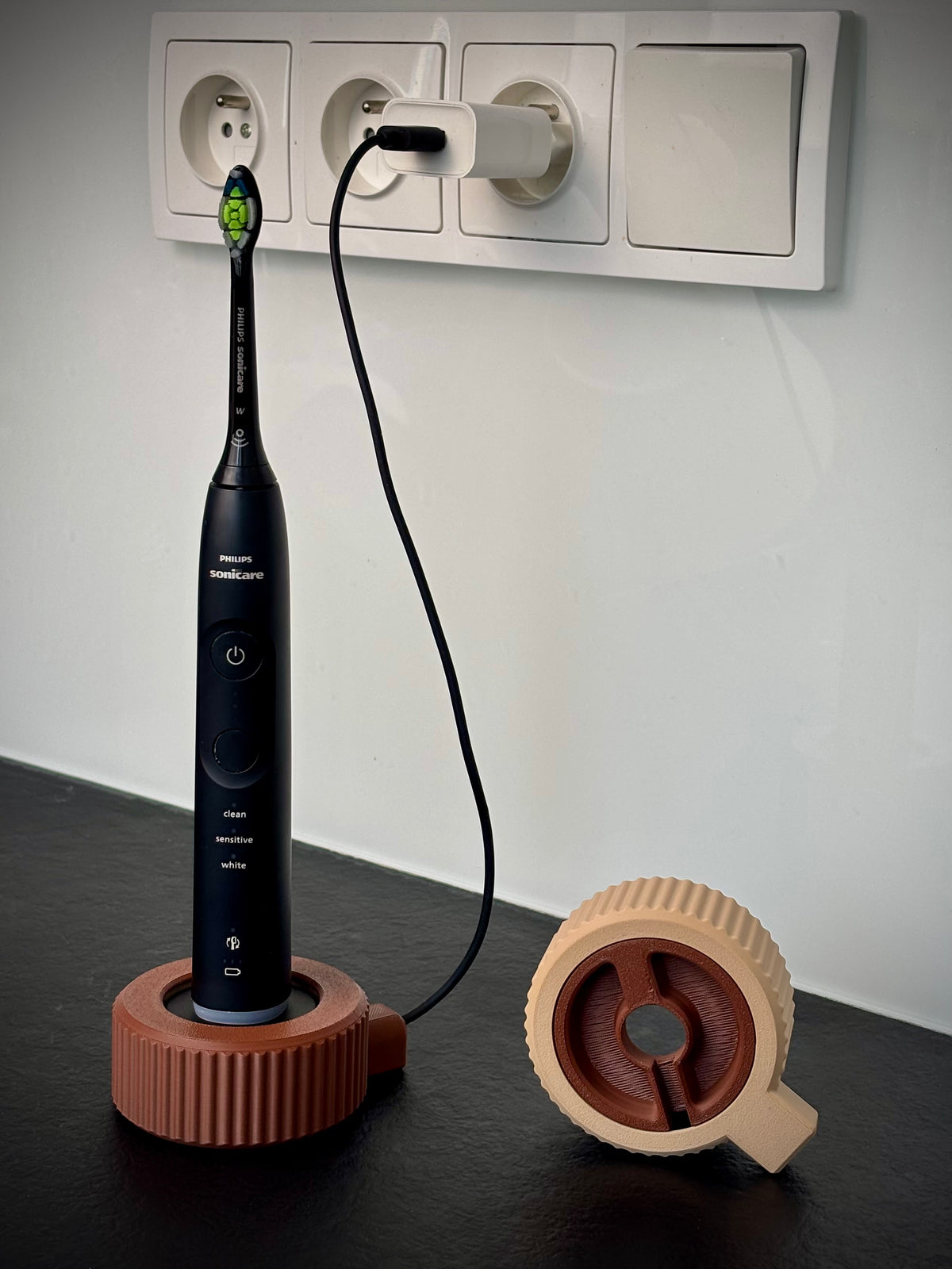 Houder voor de Philips Sonicare-lader met kabeloproller