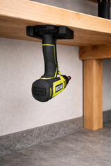 Ryobi gereedschapshouder onder de tafel gemonteerd voor handige opberging