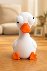 Gek ganzenfiguurtje met grote beweegbare ogen op witte achtergrond