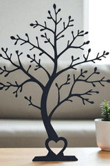 Minimalistische decoratieboom in silhouet, vooraanzicht met strakke takken