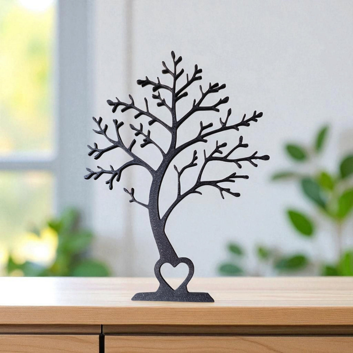 Zijdetail van de minimalistische decoratieboom met elegant gebogen profiel