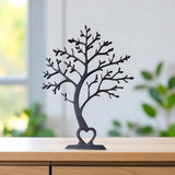 Zijdetail van de minimalistische decoratieboom met elegant gebogen profiel