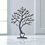 Minimalistische decoratieboom in silhouet, vooraanzicht met strakke takken