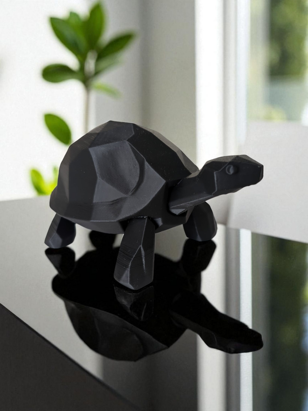 Detail van de hoekige vorm van de schildpad in geometrisch lowpoly-design