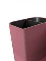 Detail van de gestructureerde binnenwanden en vakken van de bureau-organizer