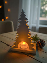Kerstdecoratie met hert en boom, achteraanzicht met ruimte voor een theelichtje