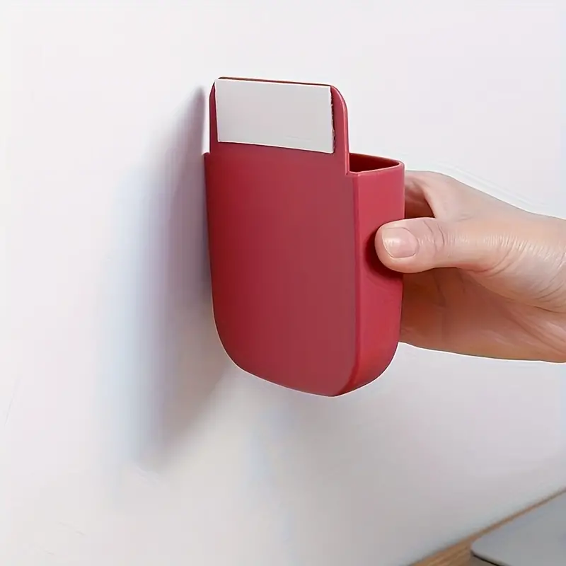 Detail van de kabeldoorvoer van een gemonteerde telefoonhouder