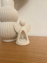 Engelenfiguur met led-theelichtje dat van binnenuit schijnt