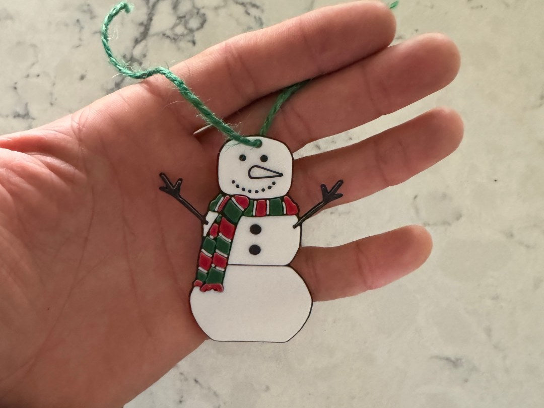 Cadeaulabel in de vorm van een sneeuwpop