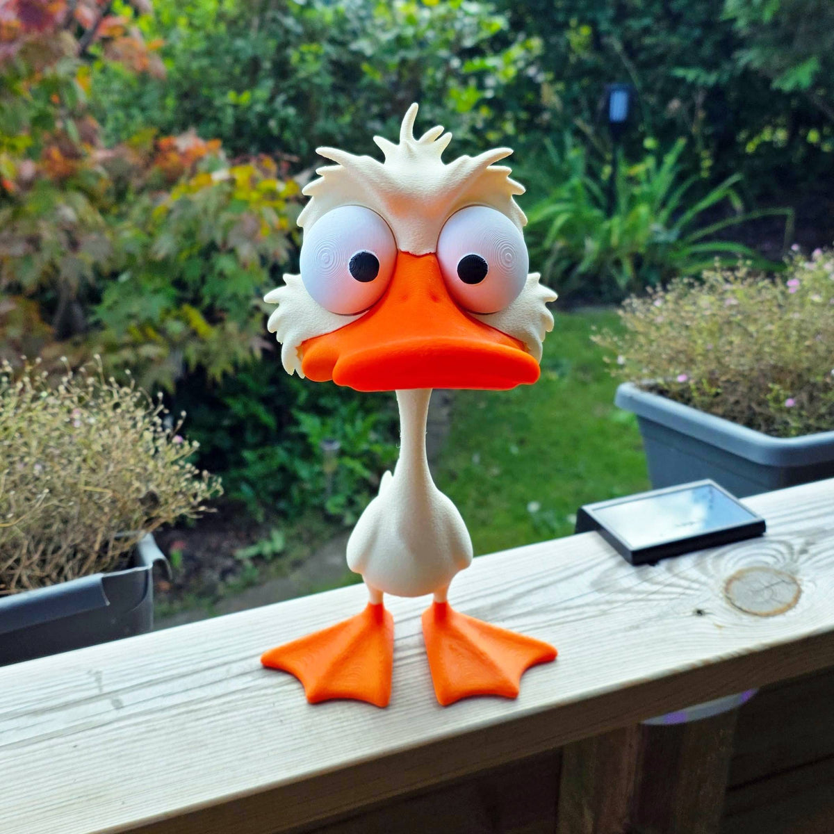 Figuur chagrijnige eend 25 cm – decoratief beeldje met grote ogen