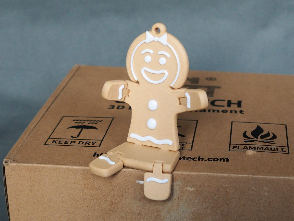Peperkoekvrouwtje-figuur voor kerst in bruin en wit