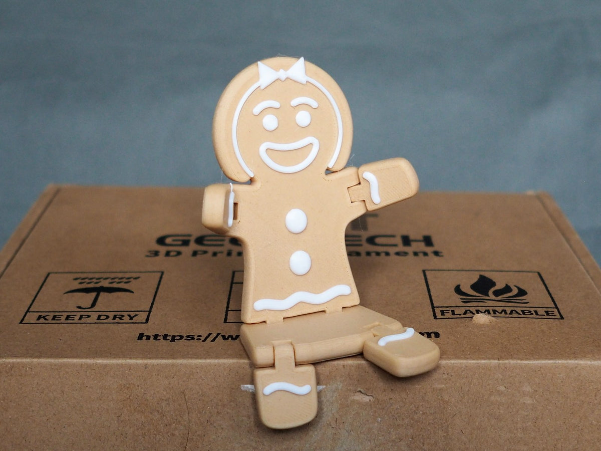 Peperkoekvrouwtje-figuur voor kerst in bruin en wit