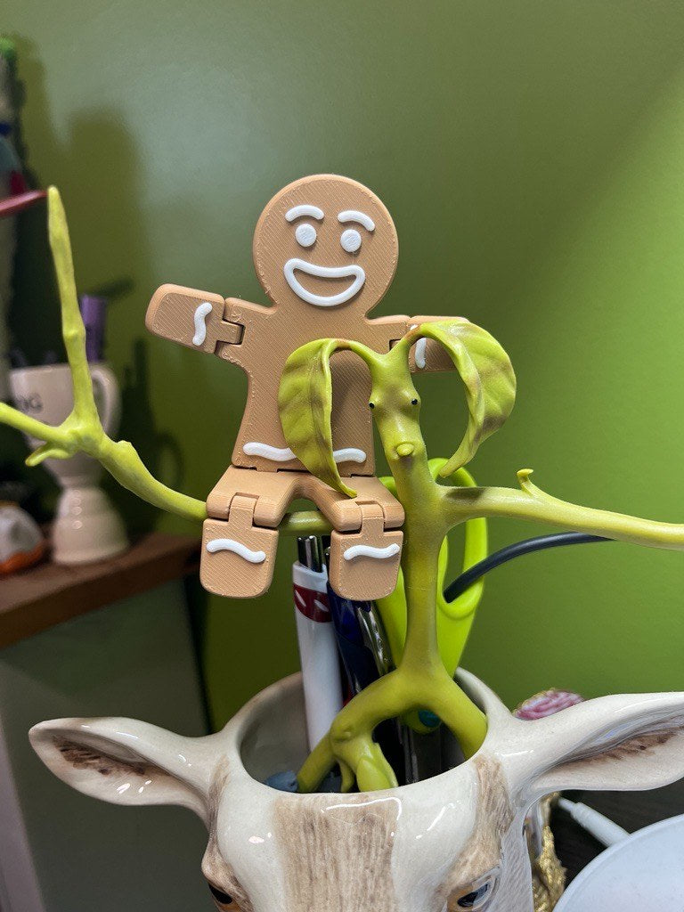 Peperkoekmannetje-figuur met beweegbare segmenten