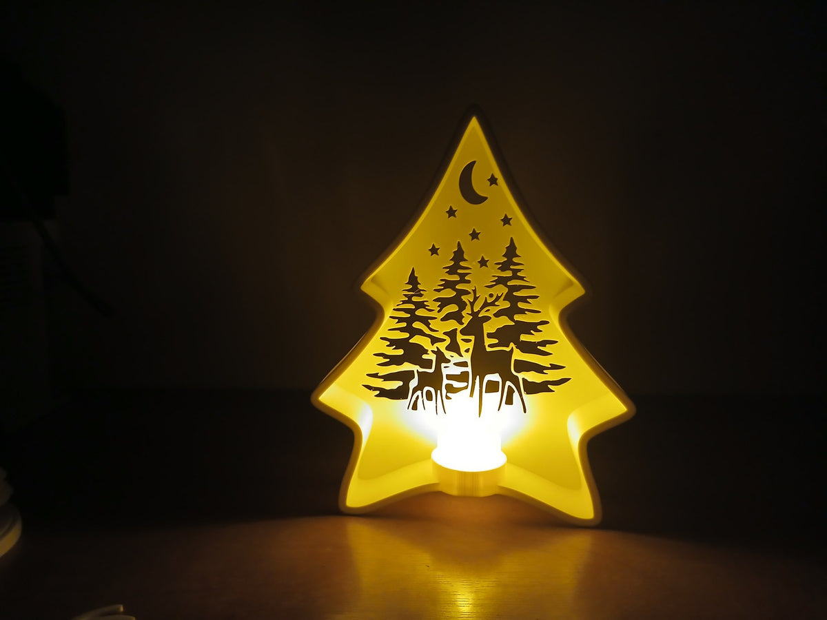 Kerstboom-theelichthouder met bosscene en rendieren