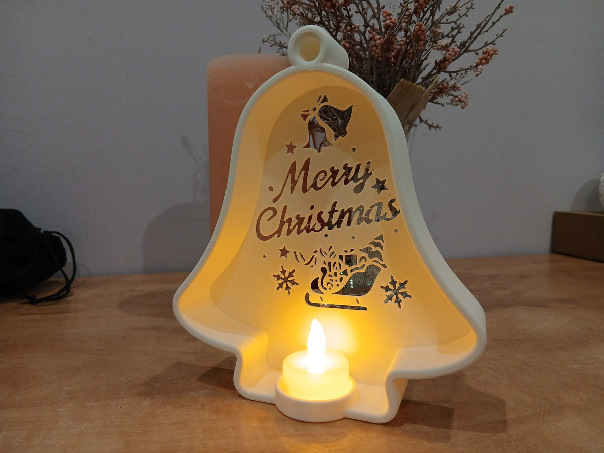 Kerstklok met uitsparingen en led-theelichtje
