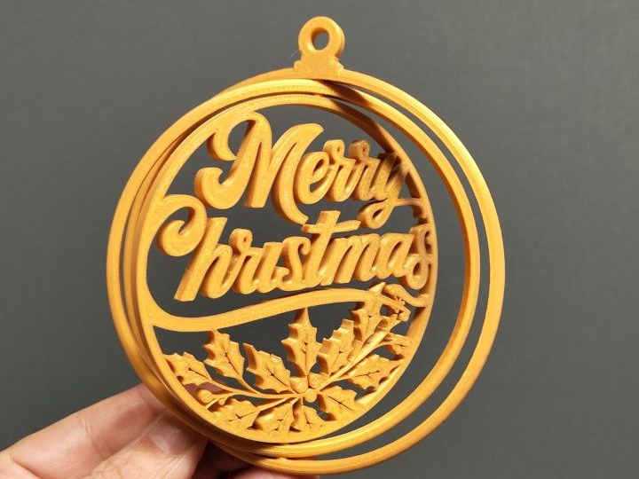 Kerstbal-gyroball met de tekst Merry Christmas