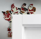 Kerstman als decoratie voor de deurhoek