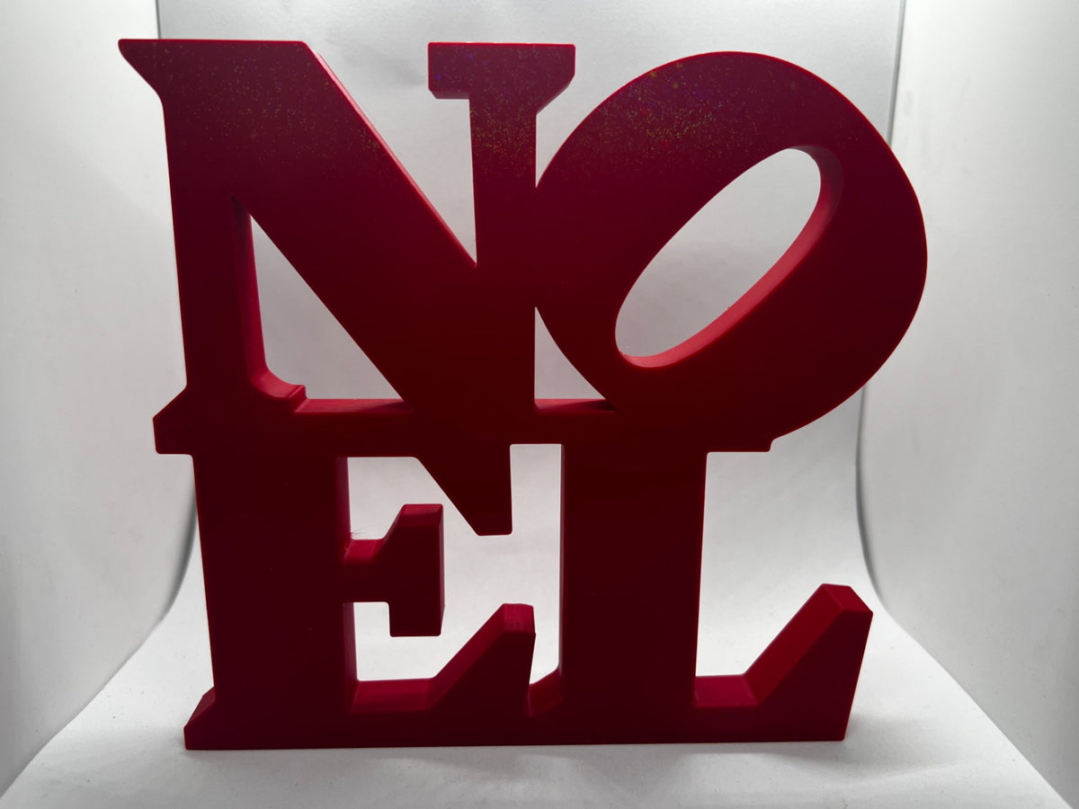 Kerstdecoratie met het woord NOEL