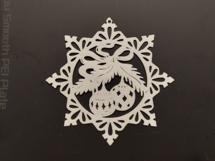 Kerstster als hanger voor de kerstboom