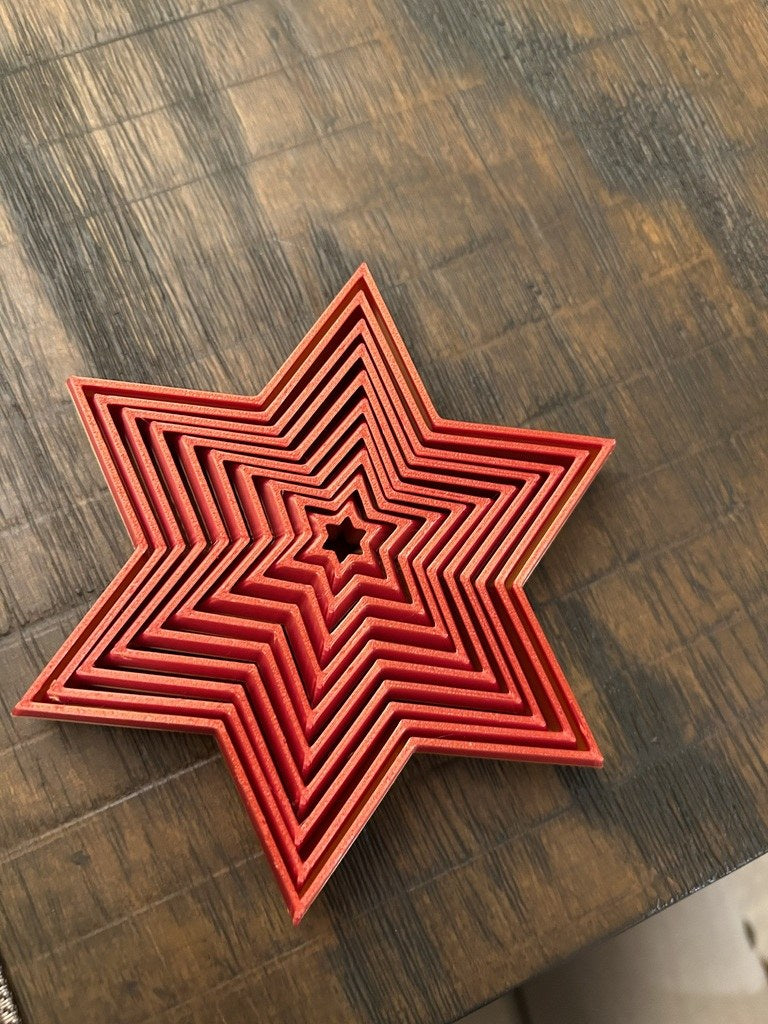 Opvouwbare zespuntige kerstster in meerdere kleuren