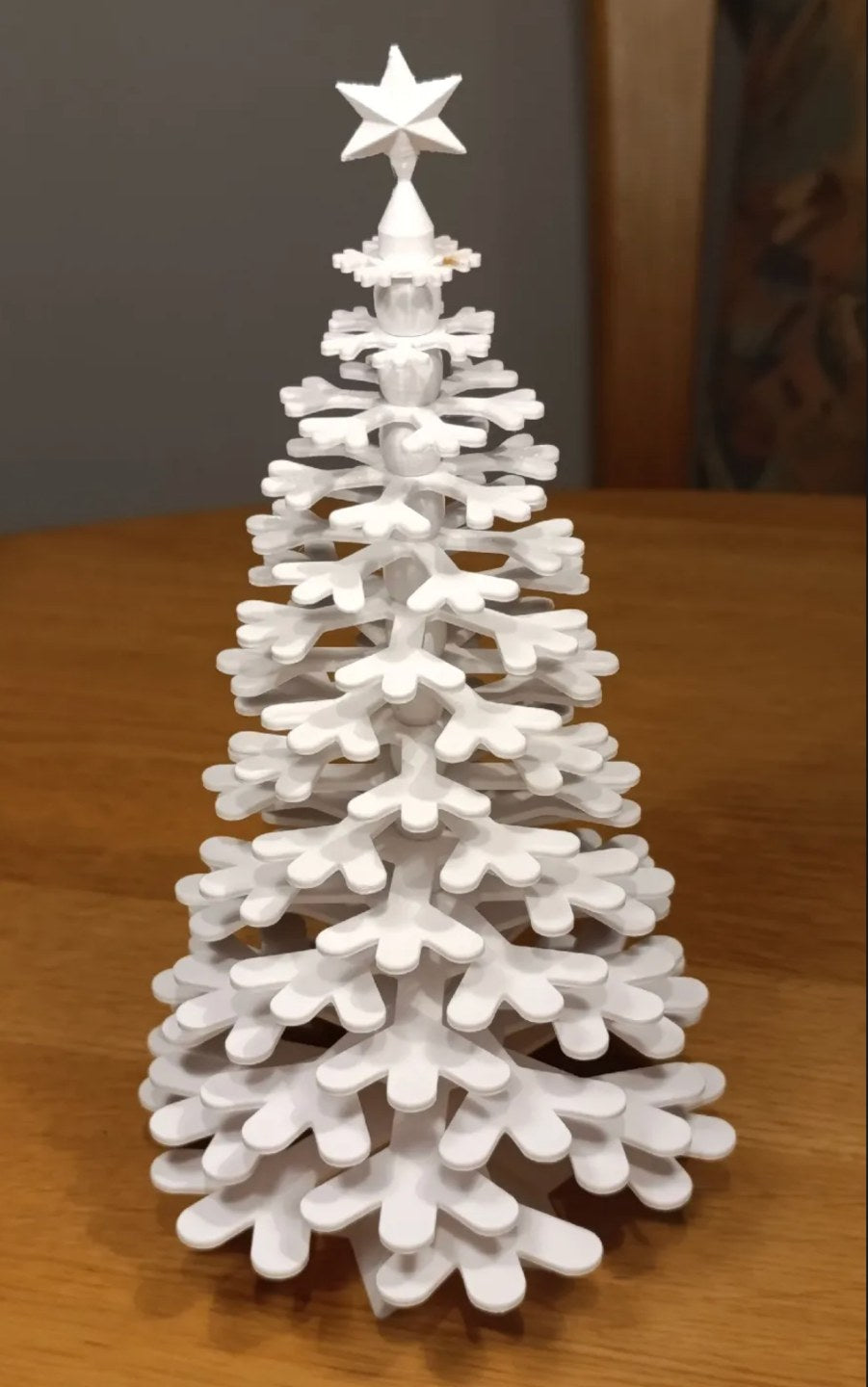 Kerstboomfiguur van sneeuwvlokken met ster