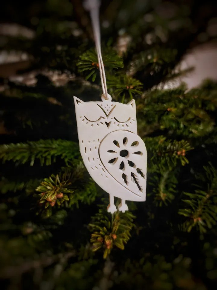 Acht kerstboomversieringen in de vorm van dieren