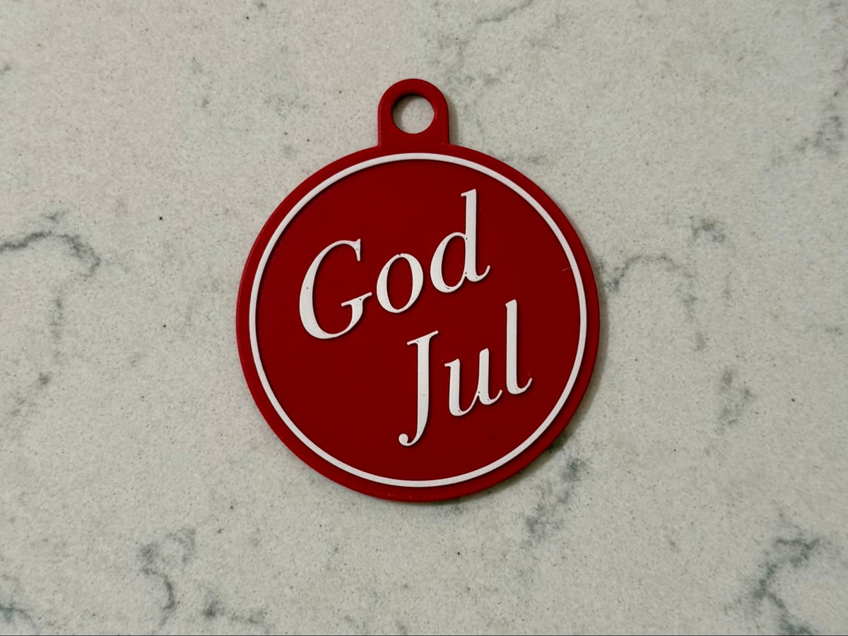 Elegante kerstboomversiering met de tekst God Jul