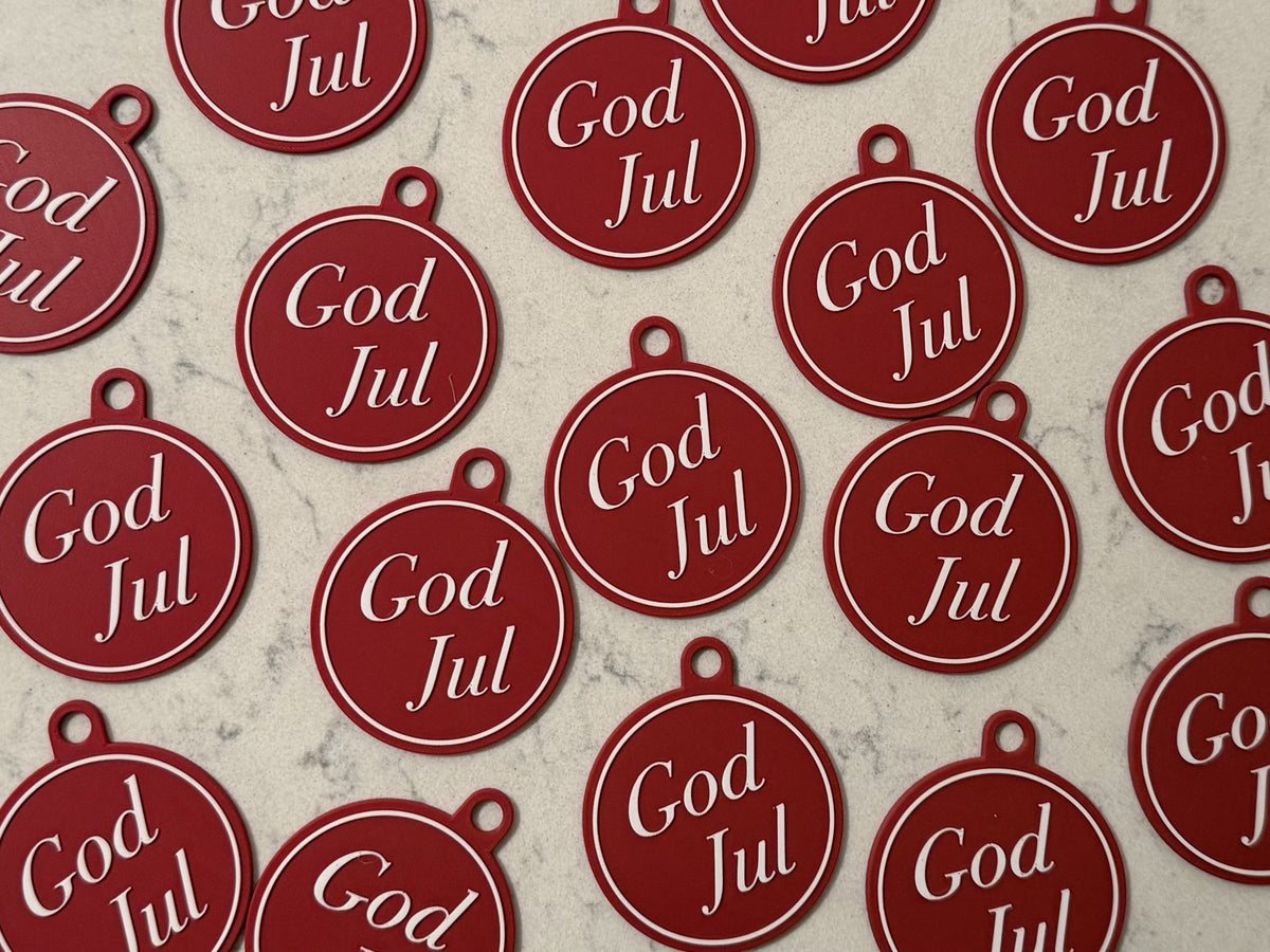 Elegante kerstboomversiering met de tekst God Jul