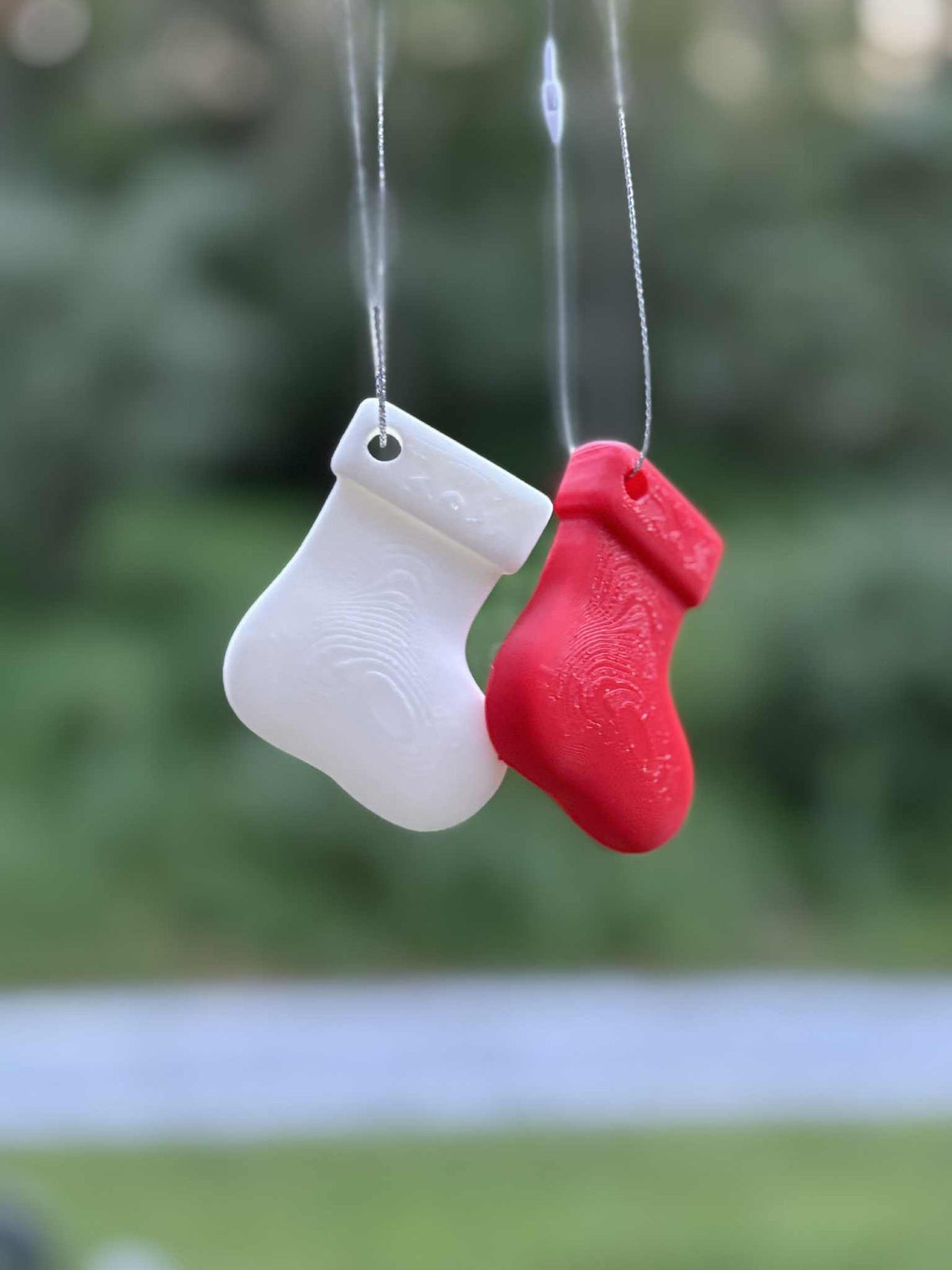 Kleine kerstsok als kerstboomversiering met ophanglusje