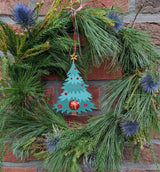 Kerstboomhanger die een chocoladebal verbergt