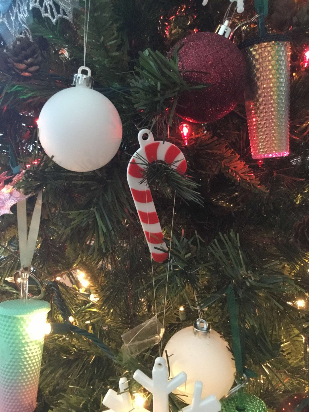 Kerstboomversiering in de vorm van een zuurstok