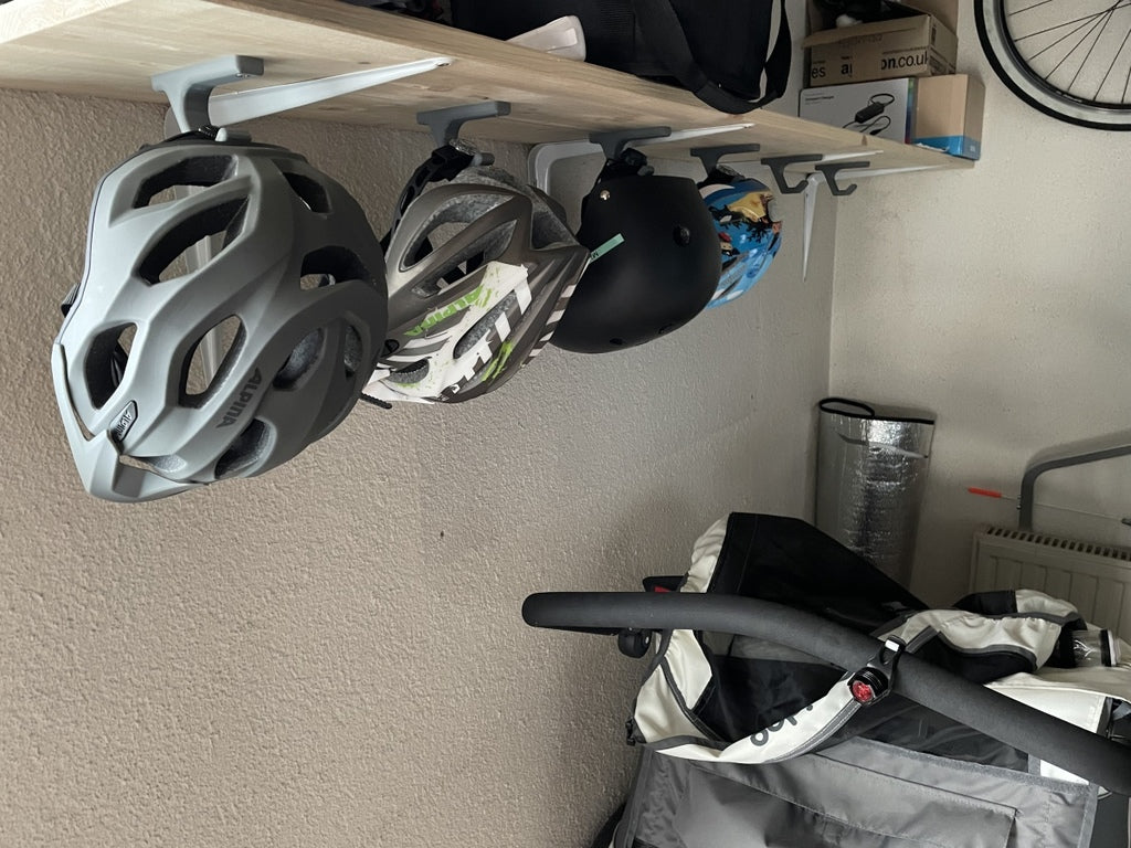Universele wandhaak voor fietshelm