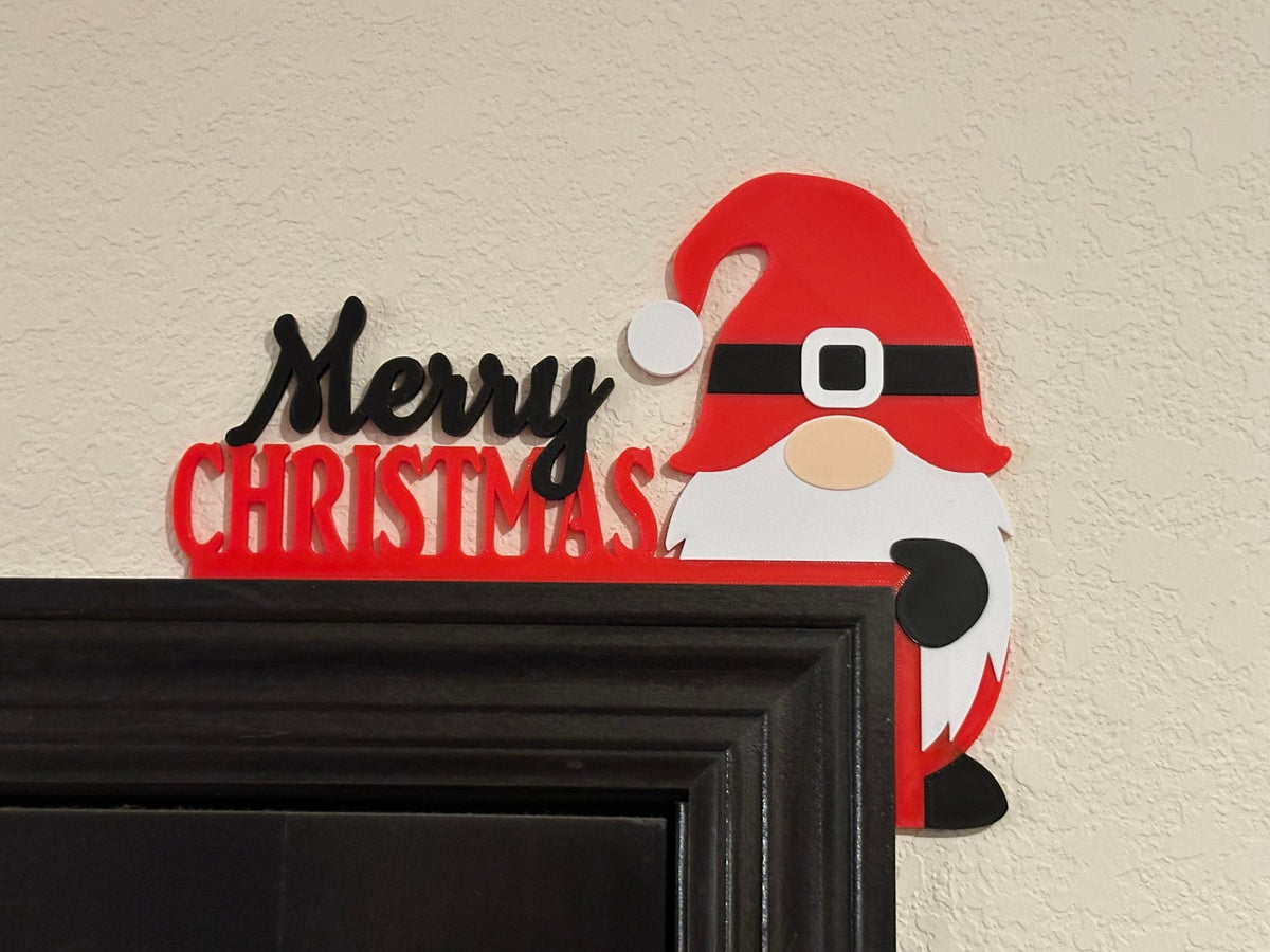 Kabouter als decoratie voor in de hoek van een deur