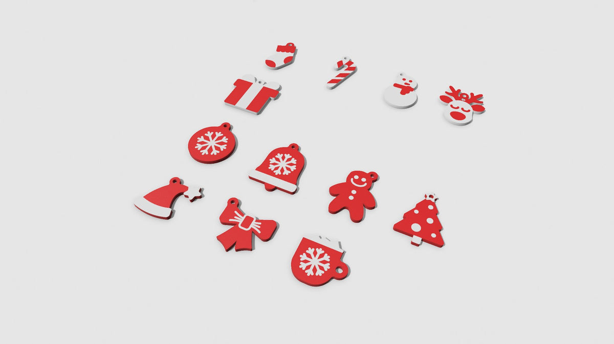 Twaalf sleutelhangers met kerstmotieven