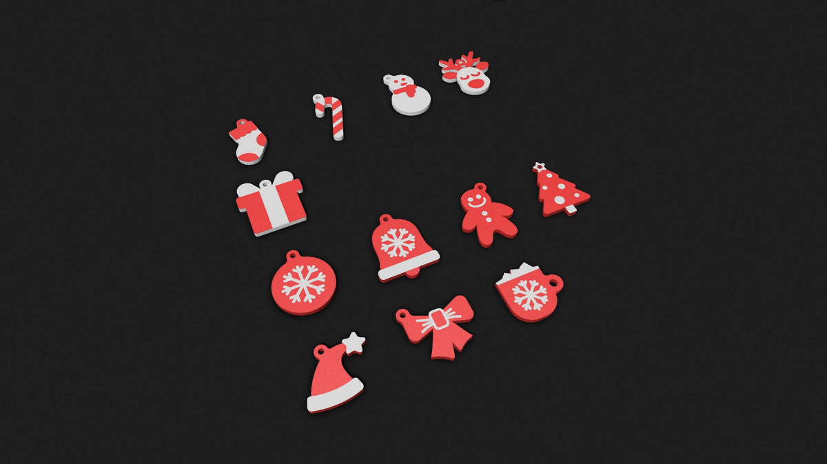 Twaalf sleutelhangers met kerstmotieven