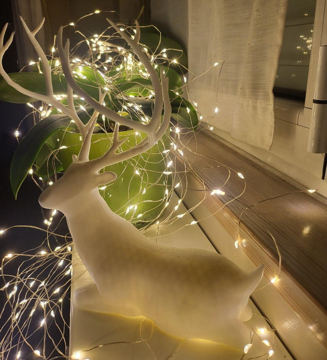 Zittend rendierfiguurtje – kerstdecoratie