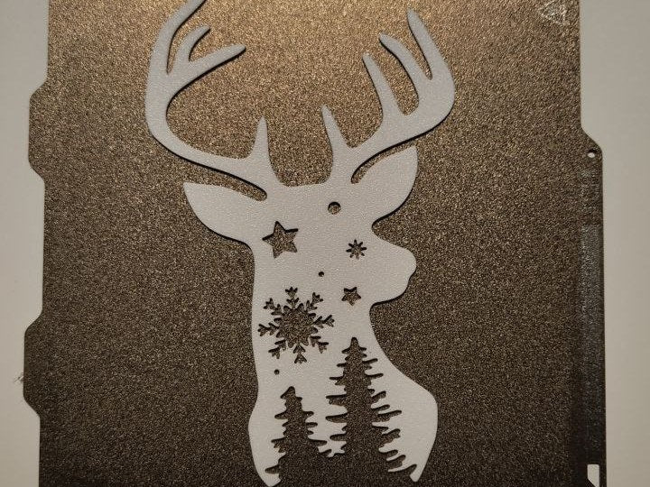 Rendiersilhouet met sterren en kerstbomen