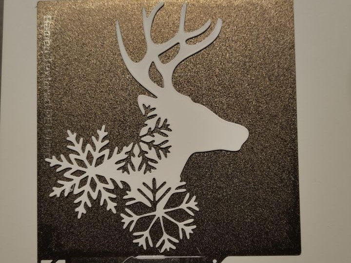 Rendiersilhouet met sterren als wanddecoratie