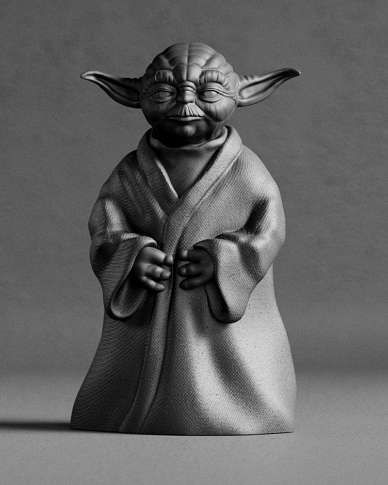 Close-up van een gedetailleerd beeld van Meester Yoda met golvende mantelplooien en rustige gezichtsuitdrukking