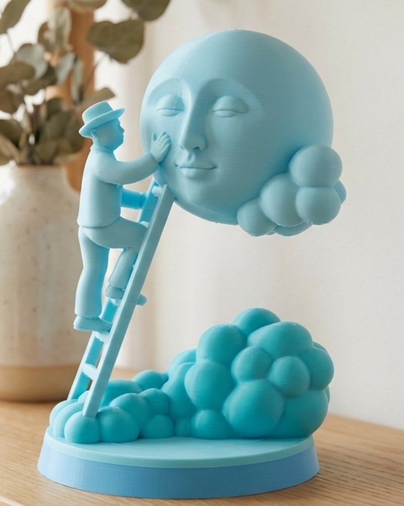 Close-up van een monochroom maanbeeld met een figuurtje op een ladder dat het gezicht van de maan aanraakt