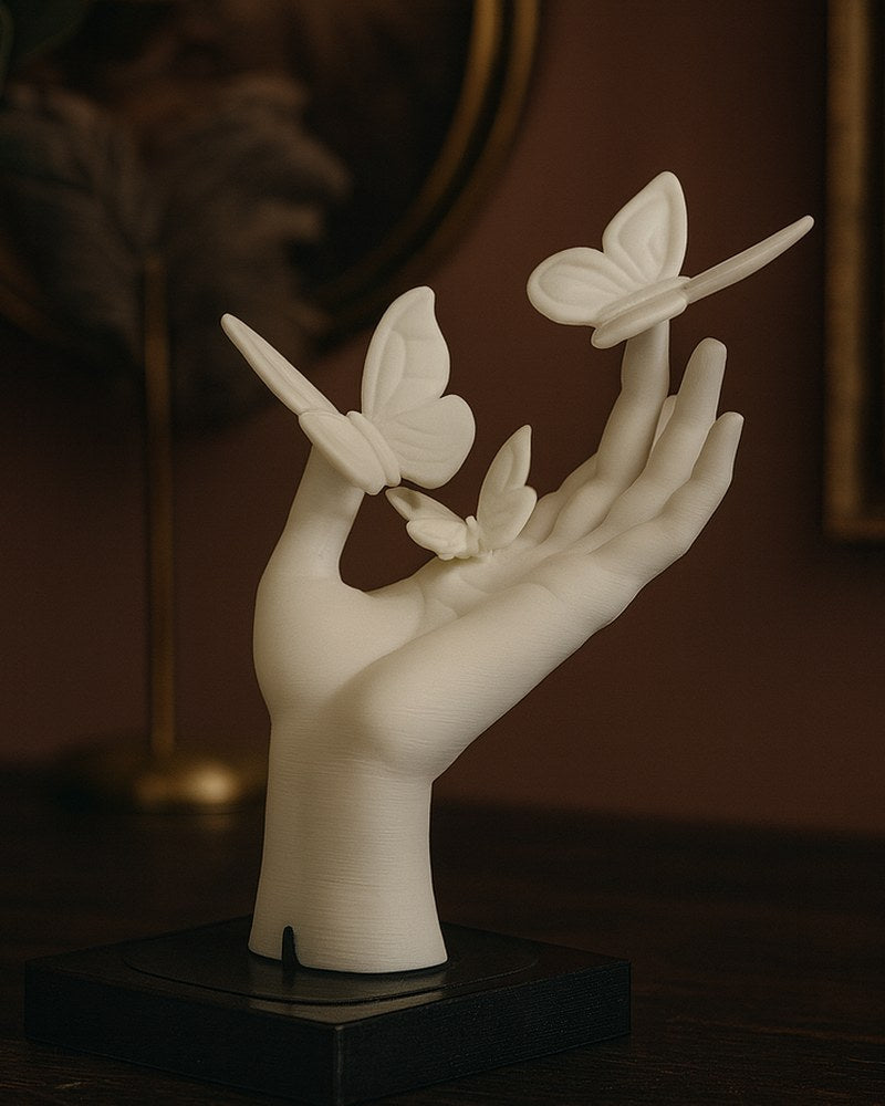 Close-up van een hand met vlinders als beeld, 5,8 cm breed