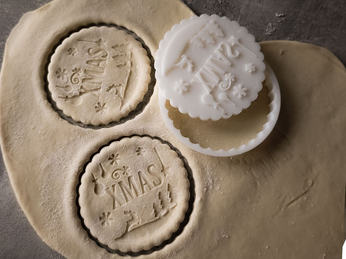 Koekjesuitsteekvorm met XMAS-stempel en rendier