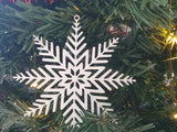 Sneeuwvlok als kerstboomversiering
