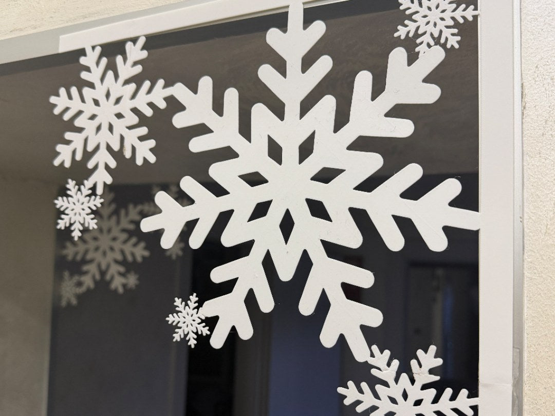Sneeuwvlok als kerstdecoratie voor deur en raam